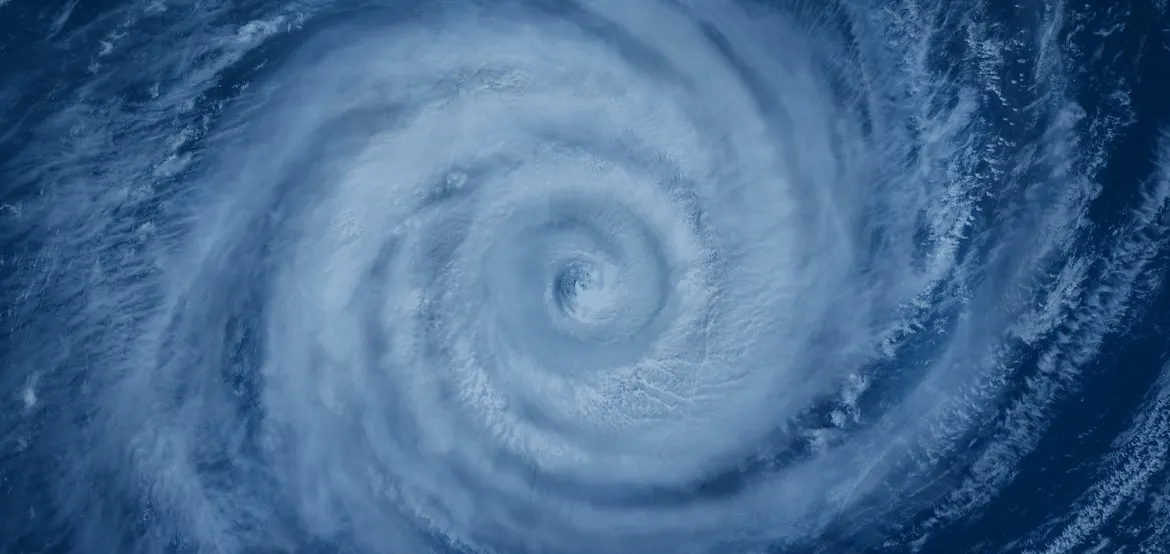 Aerial view of a large hurricane swirling over the ocean