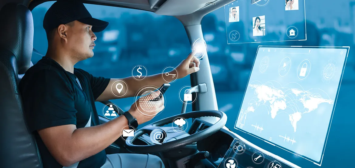 Truck driver interacting with a digital interface showing connected icons and a world map, representing smart fleet technology