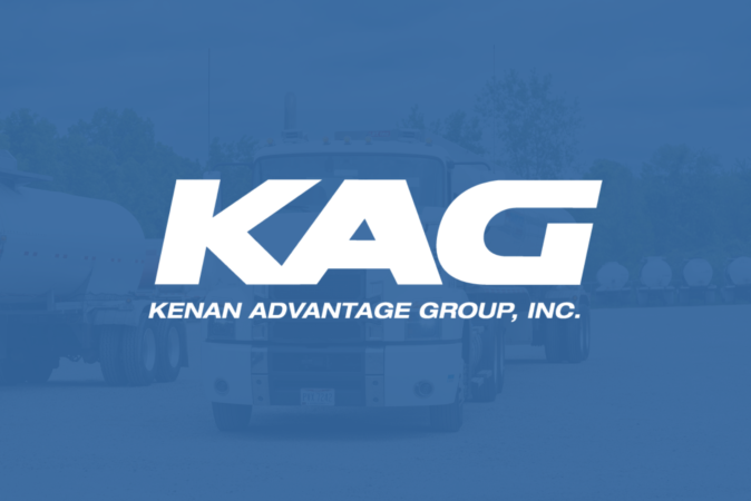 KAG — Kenan Advantage Group, Inc. logo on a blue-tinted background with trucks visible behind it