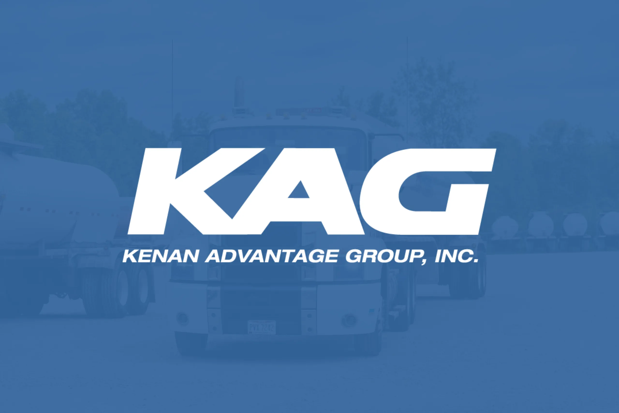 KAG — Kenan Advantage Group, Inc. logo on a blue-tinted background with trucks visible behind it