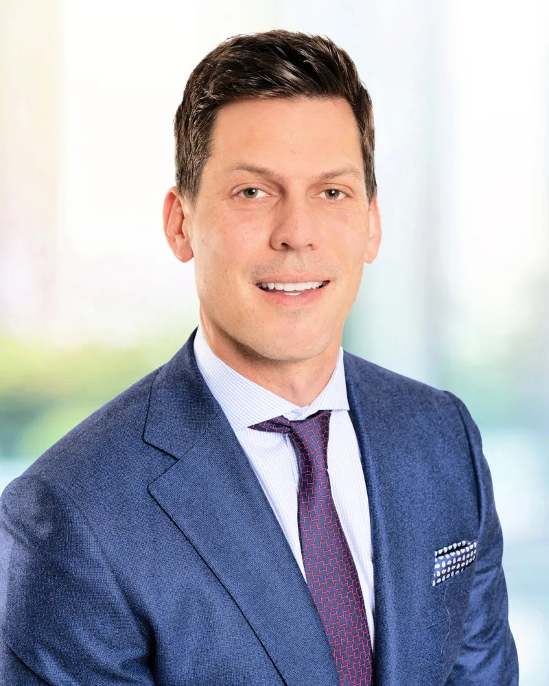 Professional headshot of KAG's CEO Charlie Delacey.