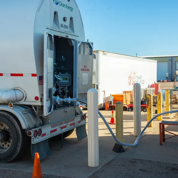 Clean Energy tanker trailer connected to a fueling station