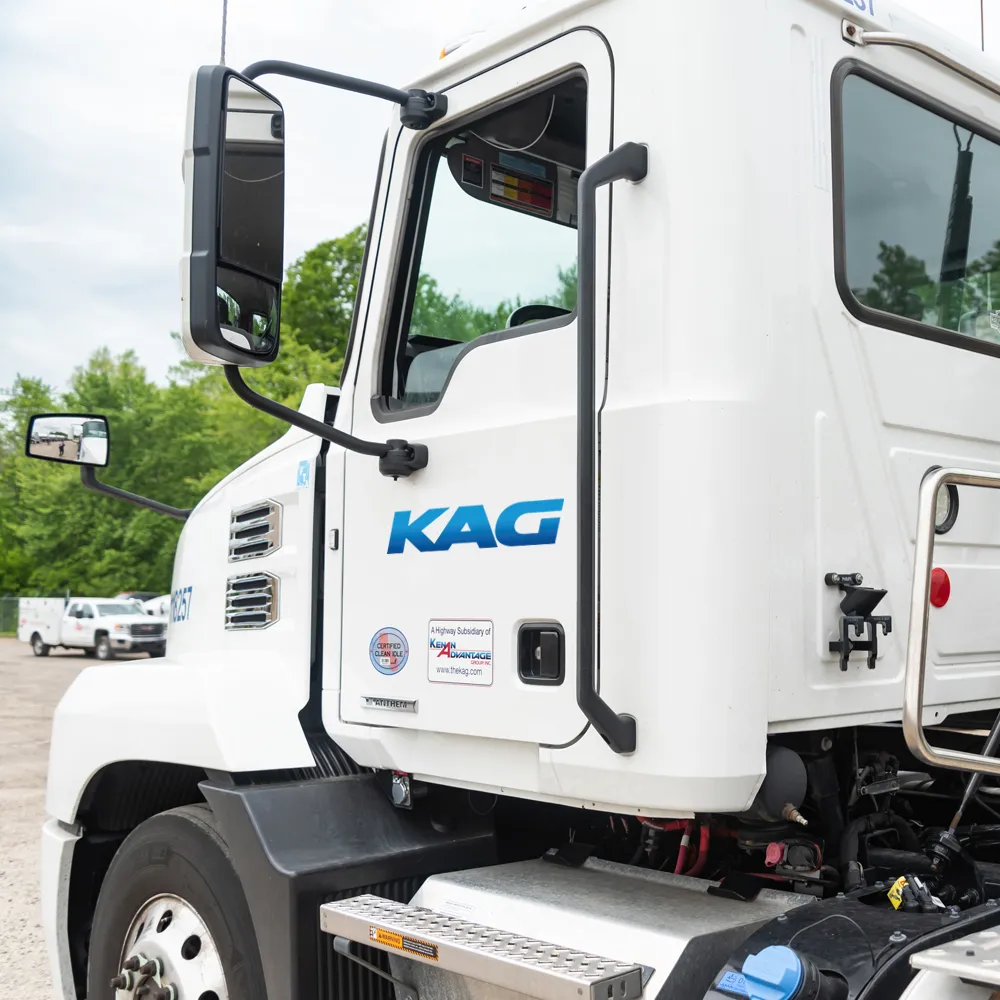 Close-up of a KAG commercial truck cab showcasing fleet equipment, vehicle safety features, and professional transportation operations.